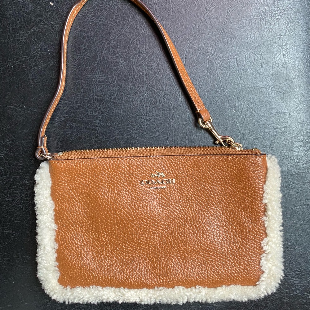 Coach wristlet 🧡